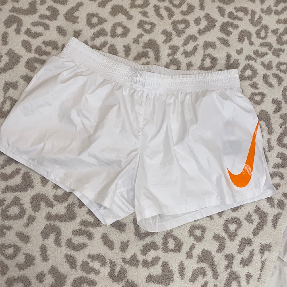 NWT -Nike standard fit women’s running shorts size large